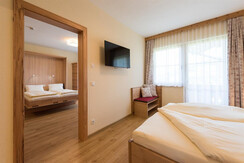 Suite Schladming Schlafzimmer und Wohnraum