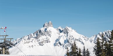 View of the snow-covered Bischofsmütze from the ski piste