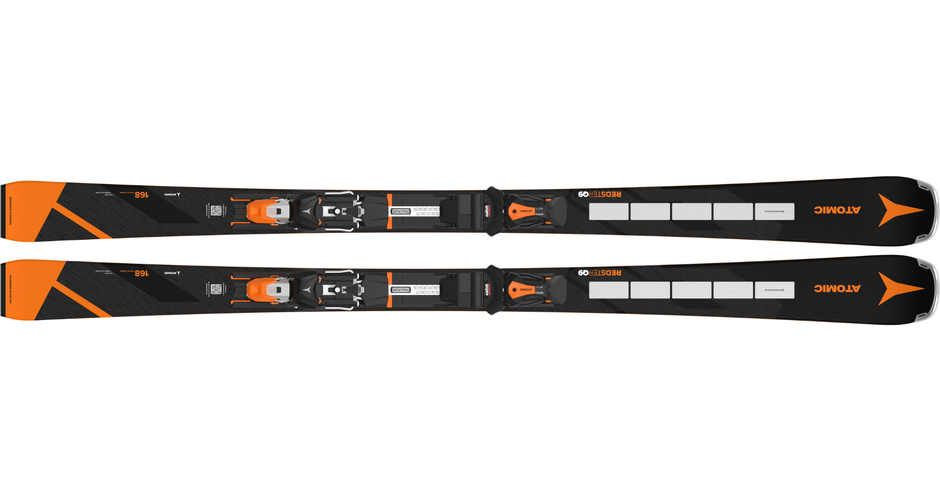 Two black Atomic Redster Q9 Revoshock S all-mountain skis with orange details and bindings | © Atomic