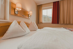 Jagdhof Doppelzimmer Bett