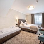 Photo of Bräu-Dreibettzimmer