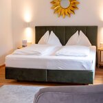 Photo of Suite Dorfblick mit Balkon und Badewanne