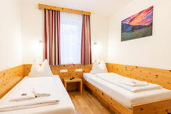 Zimmer mit zwei Einzelbetten oder Doppelbett