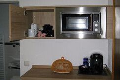 Room with shower, toilet and kitchenette