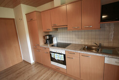 Fully equipped kitchenette in wood look