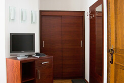 Apartment E, zubuchbares Zimmer