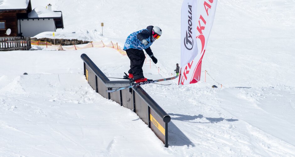 Young participant of the Zsaep Experience jumps over railings 