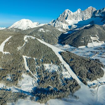 Ski mountain from above in winter and everything is covered in snow
