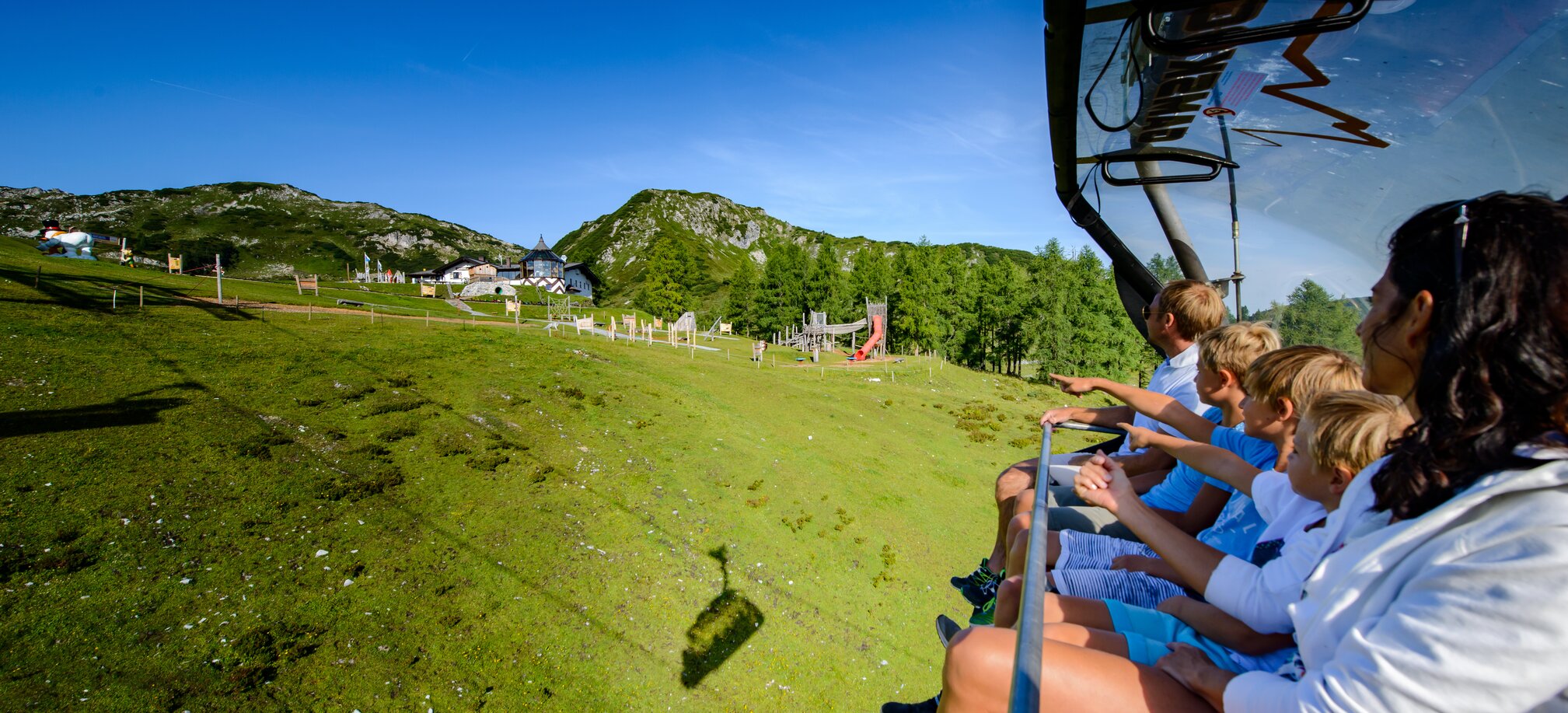 Taking the lift up the mountain in Zauchensee during summer in the Salzburger Sportwelt region in Ski amadé
