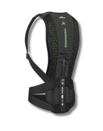 Schwarzer Komperdell Rückenprotektor mit grünen Details, atmungsaktivem Mesh und breitem Hüftgurt vor weißem Hintergrund.